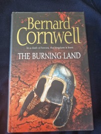 The Burning Land by Bernard Cornwall  (hard back)