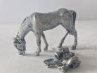 HIN30/DA01 - Horse Grazing Saddle on Ground